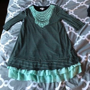 Girls dress hits at the knee